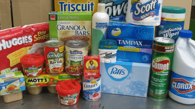 Pre-packaged food and hygiene items available at 绿帽社 Food Pantry